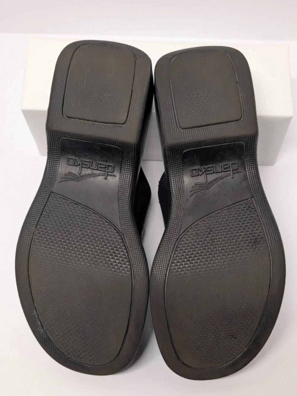 Dansko Floral Embossed Thong Sandals in Black Leather
